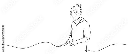 A woman uses a knife to cook, one continuous line. simple outline vector illustration. Editable stroke.