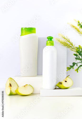 Bio Plastic white bottles with cut apples on thrones Mockup