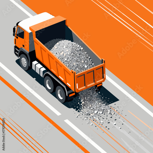 Orange dump truck unloading gravel on construction site road  