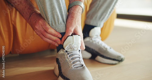 Fotografie Hands, person and ankle pain in home for joint, stiffness relief and poor circulation