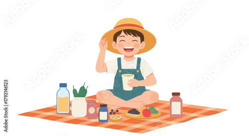A cheerful child wearing a straw hat enjoys a picnic on a checkered blanket.