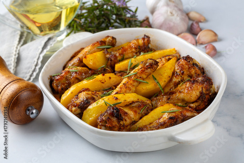 Grilled chicken wings in th...