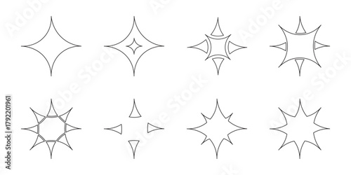 Collection of eight ornate starburst and sparkle embellishments