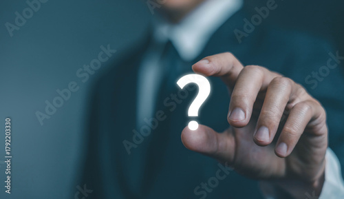 question mark shows on a laptop. concept of ask, answer, Business FAQ, Thinking, and wondering. question tech Brainstorming and problem-solving