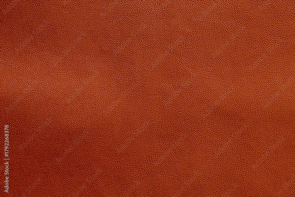 Fototapeta premium brown leather texture with small, even grains. brown leather material background