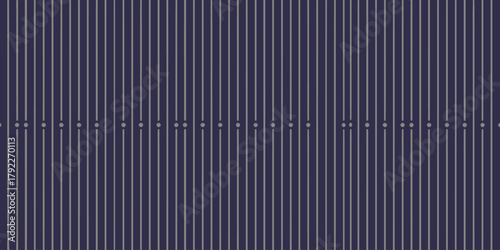 A patterned background with vertical stripes and small circles at regular intervals forming a design