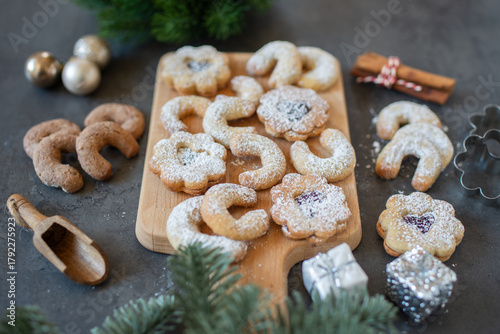 Christmas cookies baking on wooden background