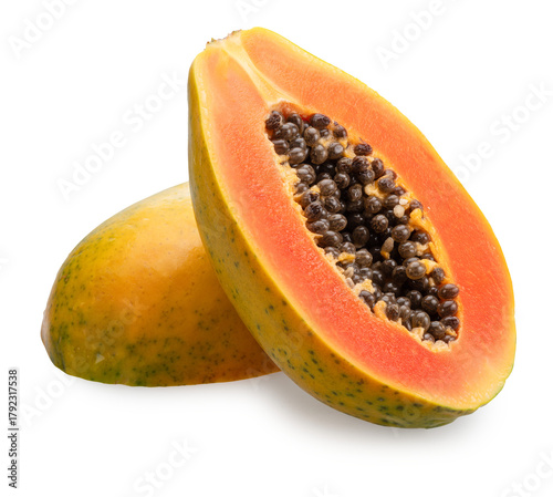Cut papaya with orange juicy flesh and black seeds on white background. File contains clipping path.