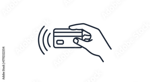 A hand holds a credit card for contactless payment with radiating waves.