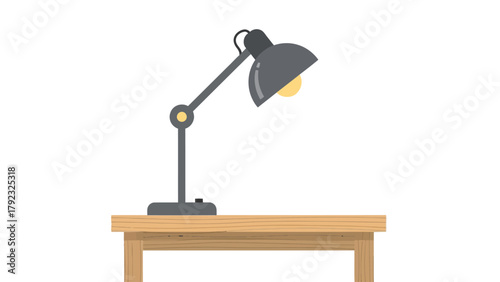 A desk lamp with a gray shade and a yellow bulb rests on a wooden table
