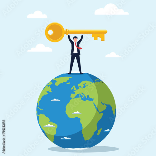 An ambitious businessman stands on the world, holding a golden key high, representing global opportunities, solutions, and unlocking worldwide success