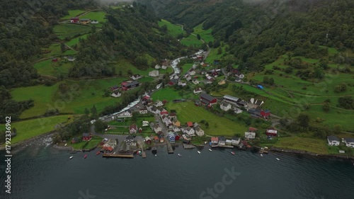 Aerial view of scenic Undredal on the fjord edge surrounded by Norwegian mountains