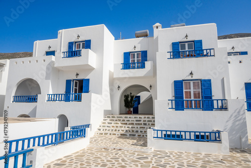 Typical Greek house with blue windows on Amorgos island, Greece