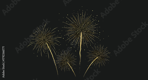 A beautiful display of golden fireworks exploding against a dark night sky.
