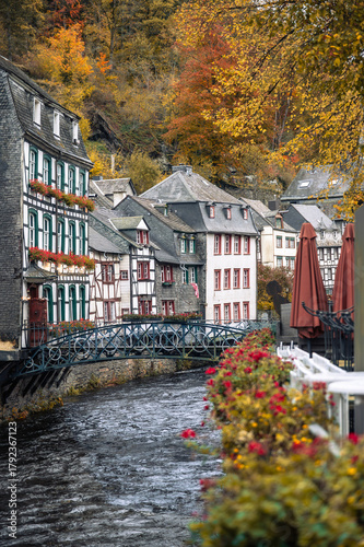 Picturesque Town Monschau with Historical Charm and the Tranquil Rur River in autumn