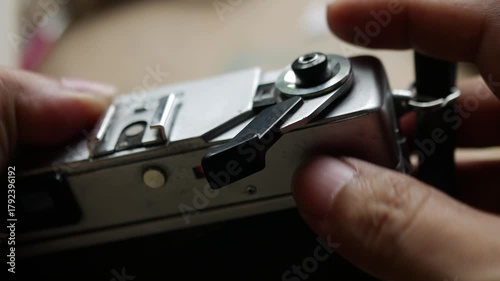 Wallpaper Mural Photographer Hand Pressing Shutter Button on Vintage Film Camera Taking Picture Action Shot Torontodigital.ca