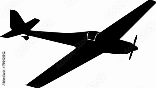 Sleek black silhouette of a vintage propeller airplane in flight, showcasing its aerodynamic design.