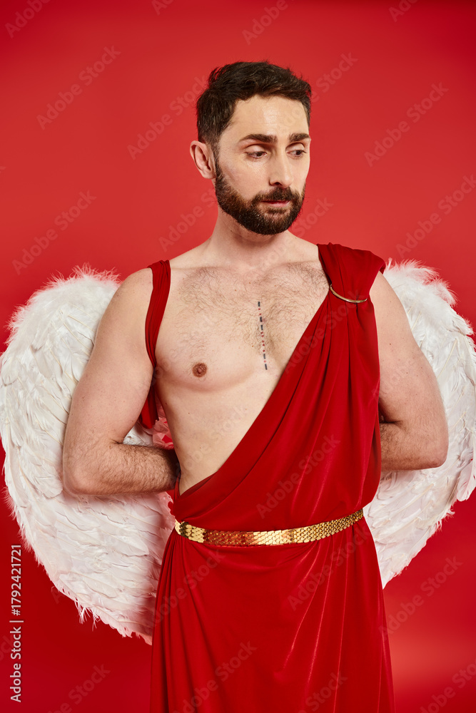 Fototapeta premium Cupid in red attire with wings celebrates love on Valentines Day