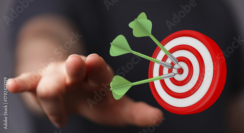 Hand reaching toward a dart...