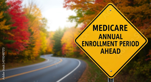 Medicare annual enrollment period sign on a winding road with autumn trees