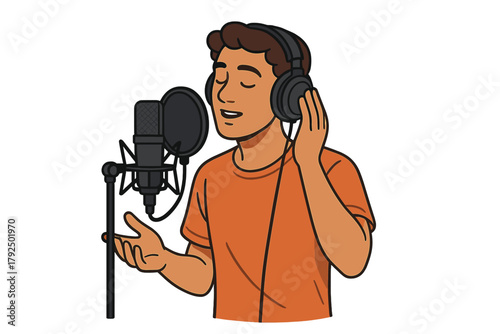 Young male artist wearing large headphones singing into a professional studio microphone for recording or broadcasting session