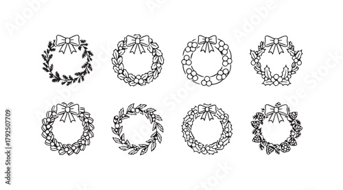 Collection of eight detailed oval floral frames in a black silhouette style