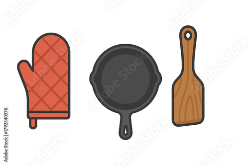 Essential kitchen cooking tools set including oven mitt, cast iron skillet, and wooden spatula