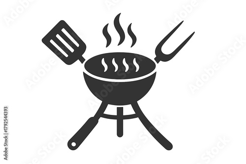 Hot smoking barbecue grill with essential cooking tools spatula and fork