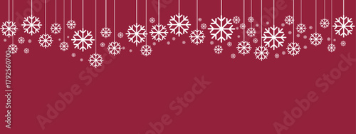 Festive holiday border/banner with white hanging snowflakes of varying sizes suspended by thin lines against a deep red background. Simple, elegant design suitable for Christmas, New Year