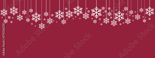 Festive holiday border/banner with white hanging snowflakes of varying sizes suspended by thin lines against a deep red background. Simple, elegant design suitable for Christmas, New Year