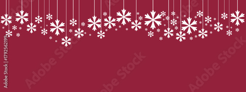 Festive holiday border/banner with white hanging snowflakes of varying sizes suspended by thin lines against a deep red background. Simple, elegant design suitable for Christmas, New Year
