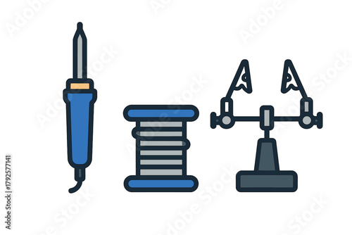 Soldering iron, spool of solder wire, and helping hands for electronics repair