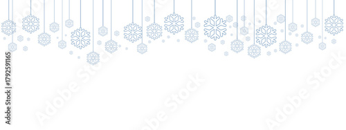Winter holiday border or banner with pale blue hanging snowflakes of various sizes suspended by thin lines against a clean white background. Minimalist, cold-toned design suitable for winter.