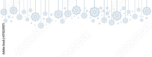 Winter holiday border or banner with pale blue hanging snowflakes of various sizes suspended by thin lines against a clean white background. Minimalist, cold-toned design suitable for winter.