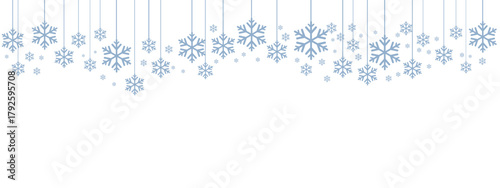 Winter holiday border or banner with pale blue hanging snowflakes of various sizes suspended by thin lines against a clean white background. Minimalist, cold-toned design suitable for winter.