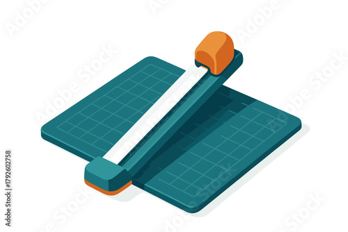 Professional rotary paper trimmer tool resting on a green grid cutting mat