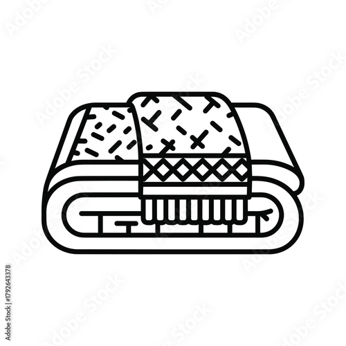 Folded blanket with geometric pattern