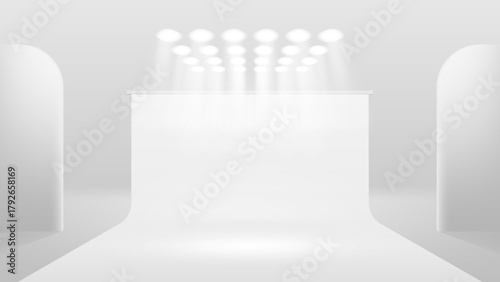 Minimal white studio background with spotlight illumination, curved walls, and empty podium stage for product presentation or advertising