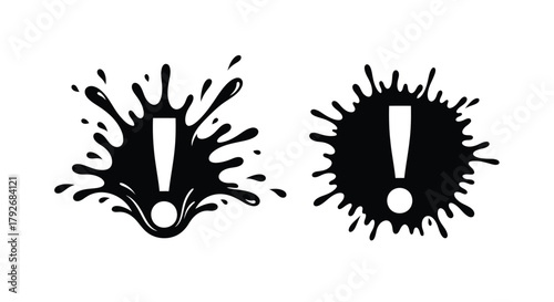 Two black ink splatters with exclamation points inside isolated on white