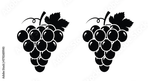 Two bunches of black grapes depicted in a simple monochrome illustration