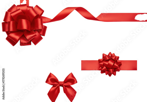 Red satin ribbons and bows, large bow top left, small bow on ribbon bottom, flowing strand, white background, copy space, clean studio lighting, gift decoration concept