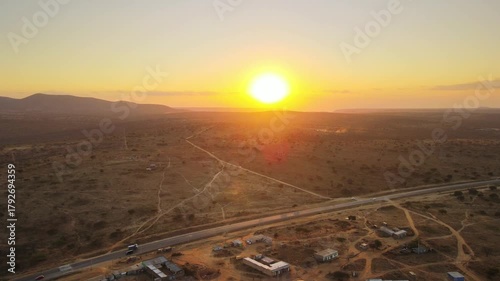 Aerial sunset over kenyan savannah landscape