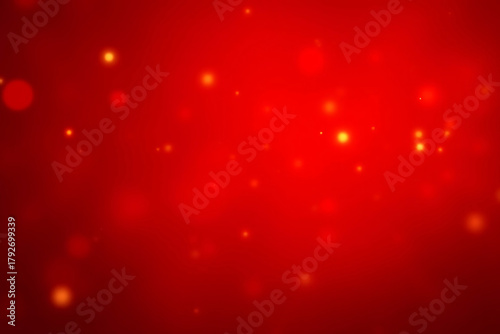 Abstract red background with golden bokeh lights and subtle texture