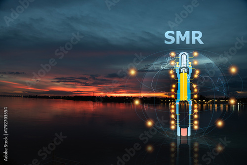 SMR text and small nuclear power plant icon on sunset background.