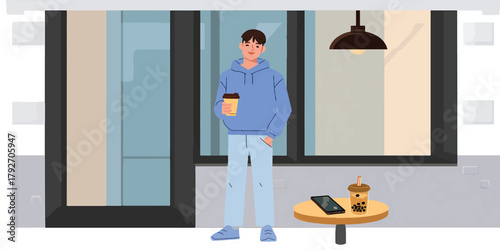 Young man enjoying a coffee break outside a cafe