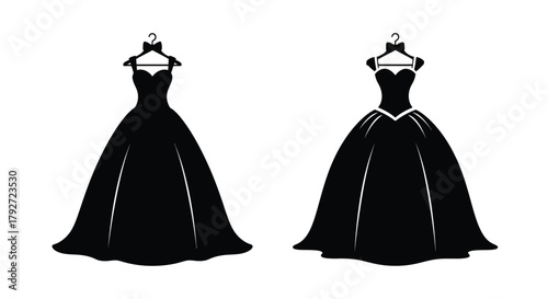 Black silhouette of two elegant evening gowns hanging on garment hooks
