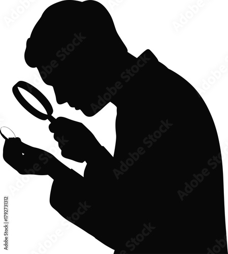 silhouette of person inspecting coin with magnifier