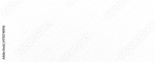 Stippled gradient texture. Fading grain dotted background. Sprayed grunge noise surface. Black dots, speckles, particles specks, dust, dots wallpaper. Subtle halftone gritty sand overlay.