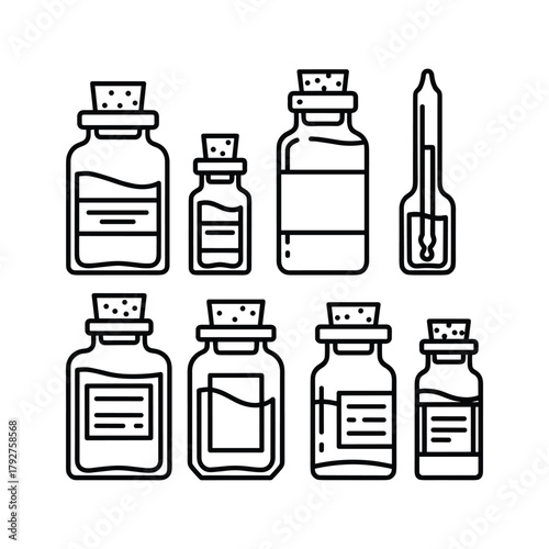 Set of glass bottles with cork stoppers