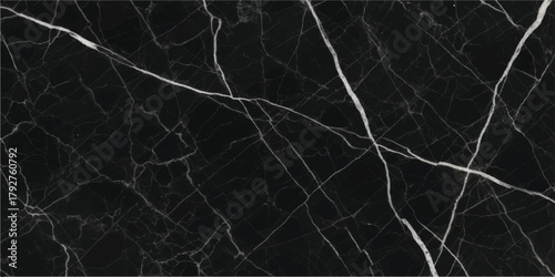 Dark vintage texture of dead tree branches in the night snow creating a grunge macro pattern backdrop